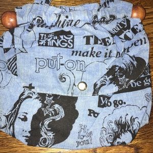 Vintage flap front blue w/black words/pictures bag